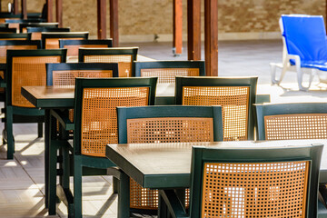 Chairs and tables in a cozy street cafe