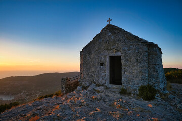 Sunset at Komiza from Hum, highest peak of Vis island, Croatia