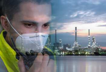 Technical supervisor wearing a mask is operating a crew through a radio communication in the...