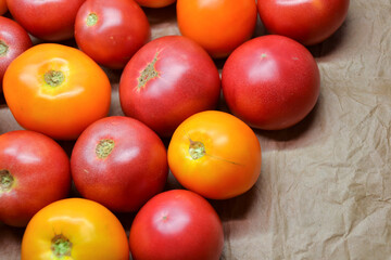 Tomatoes summer harvest. Village garden harvest. Tomato from farmers market. Fresh red and yellow tomatoes. Organic vegetables.