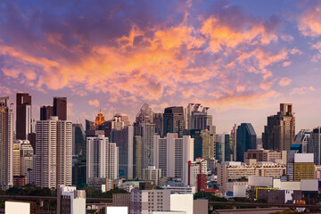 Fototapeta na wymiar Bangkok, Thailand - September 25, 2020 : cityscape of Bangkok city skyline with sunset sky background, Bangkok city is modern metropolis of Thailand and favorite of tourists
