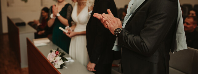 Wedding ceremony. Wedding couple leaving their signatures