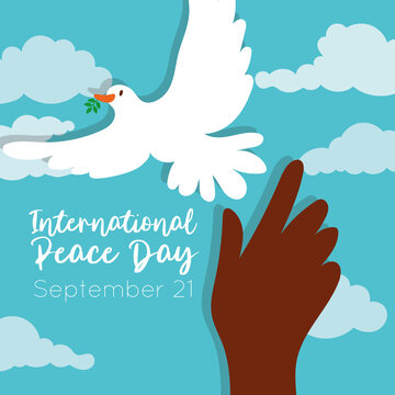 International Day of Peace lettering with dove and afro hand