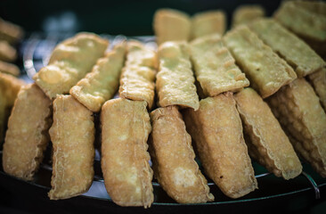 Fried Tofu, a food at the Vegetarian Festival of Chinese-Thai people, is available for sale in Naklua market. Pattaya, Thailand