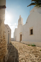 A traditional street with orthodox church at Folegandros town, Folegandros island, Greece