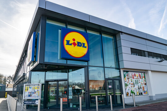 Mouscron,Belgium-February 17,2019: View of Lidl supermarket and logo.Lidl Stiftung & Co. KG  is a German global discount supermarket chain,operating in 26 European countries and the United States.