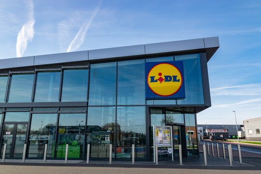 Mouscron,Belgium-February 17,2019: View of Lidl supermarket and logo.Lidl Stiftung & Co. KG  is a German global discount supermarket chain,operating in 26 European countries and the United States.