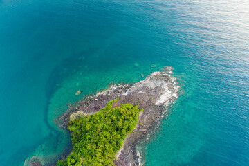 Naklejka na ściany i meble Aerial view seascape tropical green tree forest on sea island