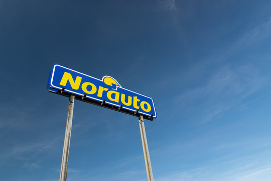 RONCQ,FRANCE-February 20,2019: Norauto brand logo on a blue sky background.Norauto is a French based company group which focuses on car repairs, car accessories and car parts.
