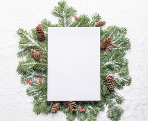 Fototapeta na wymiar New Year Christmas background with green branches blank white . Flat lay .