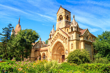 Fototapeta na wymiar View of the Jaki Chapel chapel in the Romanesque style on the territory of the Vajdahunyad Castle in the City Park of Budapest, Hungary