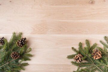 Christmas composition. Christmas gifts, pine branches, toys on wooden background. Flat lay, top view.