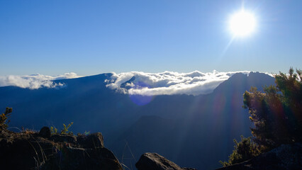 Panoramic view over the mountains of Reunion Island with a sea of clouds