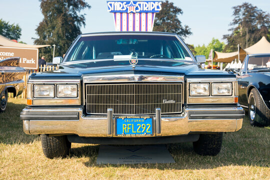 Jüchen, Germany - August 2019. Front View Of A Black 1980s Cadillac Brougham. The Cadillac Brougham Was A Line Of Luxury Cars Manufactured By General Motors.