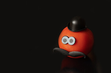 cheerful tomato with eyes on background