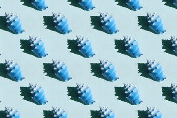 Seashell pattern on blue background.
