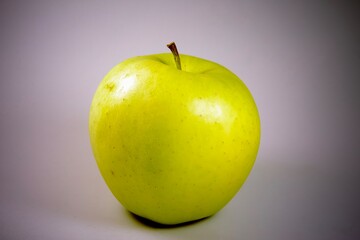 green apple on a black background