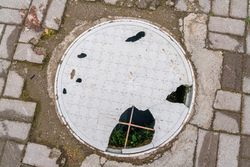 The broken drain cover in Sichuan province in China