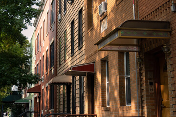 Row of Awnings on Old Colorful Wood Homes in Greenpoint Brooklyn