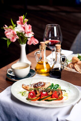Dish of pike-perch with vegetables.