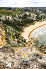 Mountains of steel and stones on the seashore. Wild beach. holidays, privacy, 