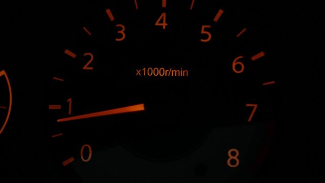 car speedometer on black background dashboard odometer overrunning