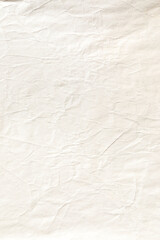 Vertical crumpled brown paper texture
