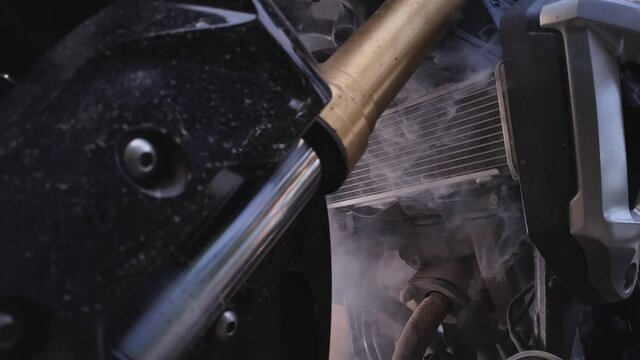 An engine that is so hot that there is smoke.