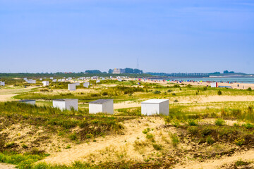 Beautiful dutch sand dunes of Breskens with cottages and view on the beach, Zeeland, The Netherlands