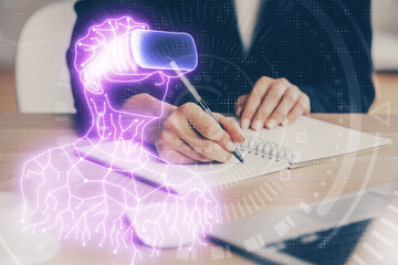 AR hologram over woman's hands taking notes background. Concept of augmented reality. Multi exposure