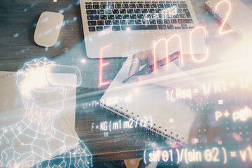 Science formula hologram over woman's hands taking notes background. Concept of study. Double...