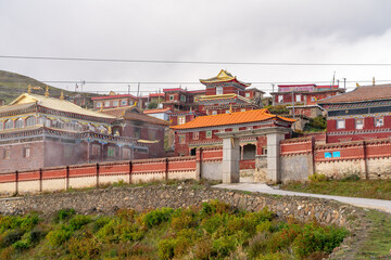 Fototapeta premium The amazing view of tibetan buddhist academy and monastery - Dongga Temple on Tibet