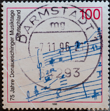 GERMANY - CIRCA 1996 : a postage stamp from Germany, showing a sheet of music on the occasion of the Donaueschinger Musiktage 75 years