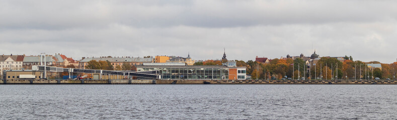 Fototapeta premium Passenger port in the city. View over the river