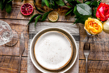 ceramic tableware top view on wooden background mock up
