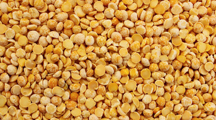 Pea background. Yellow dried peas texture