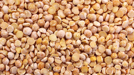 Pea background. Yellow dried peas texture