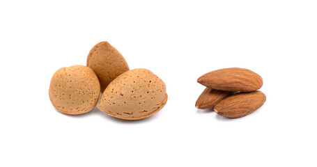 Heap of fresh almonds in shells isolated on white background