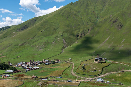 Bird eye view on Lamaria Church of the Virgin Mary in Ushguli community, located on a hill near Zhibiani village. Built in the 11 century and one of the most important historical monuments in Svaneti.