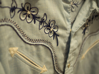 Close up view of a vintage western shirt. 
