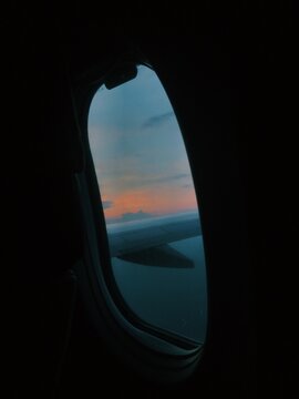 window palne  with beautiful sunset