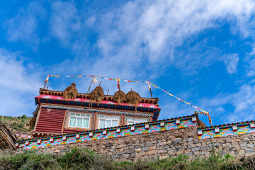 Fototapeta premium The view of traditional old small tibetan remote village and family house on Tibet