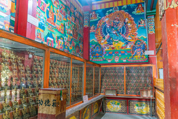 Fototapeta na wymiar The view inside the ancient old buddhist temple on Tibet