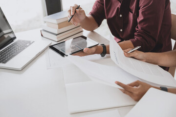 Startup concept, Group of young people brainstorming shared business idea.