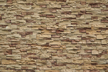       A wall of natural flat stones. Texture for background.