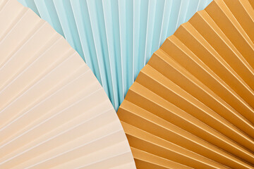 Abstract background with textured paper fans. Festive celebration backdrop