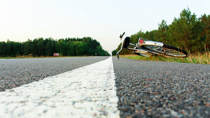 bike on the side of a very long road