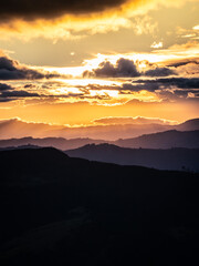 Fototapeta na wymiar Yellow sunset landscape for a smartphone background