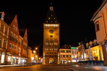 Fototapeta na wymiar The Old Gate Altpoertel in Speyer, Germany at night. The medieval city gate