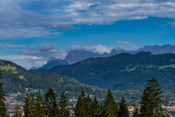mountain view of the karwendel mountains with clouds in bavaria, germany